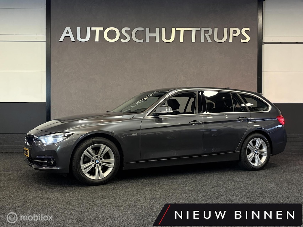 BMW 3-Serie Touring 320i High Executive SPORTLINE / LEDER / AUTOMAAT / TR.HAAK / NAVI / STOELVERW. /