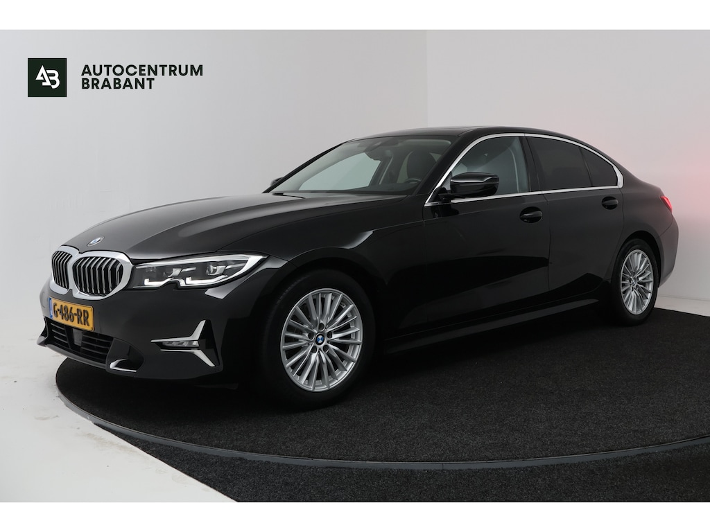 BMW 3-Serie 320i High Executive (PANORAMADAK, DEALER ONDERHOUDEN, STUUR-/STOELVERWARMING, SFEERVERLICHTING)