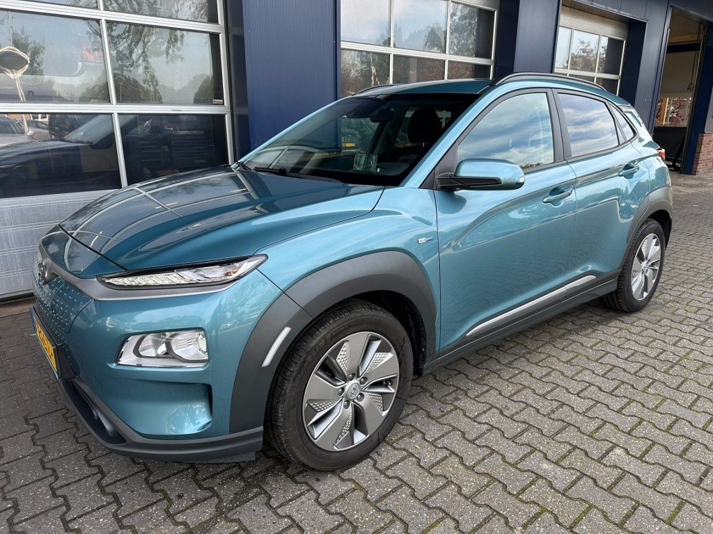 Hyundai Kona EV FASHION 64 KWH, 3-fase, Camera, Warmtepomp, Carplay, Navi, Keyless, ALL IN prijs!