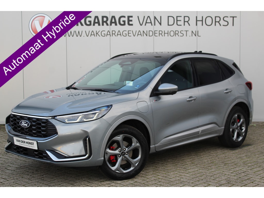 Ford Kuga 2.5 243 pk PHEV ST-Line X Maart 2026, slechts 9.800km ! Autm. airco dual, elektr. panodak, elektr. achterklep, leer/alcantara, klep, LED verl., navigatie, telefoonvoorb., stoel-, stuur-, voorraam- en achterbankverw., side- en lan
