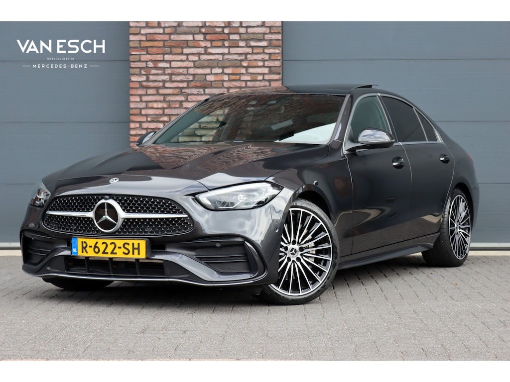 Mercedes-Benz C-klasse 200 AMG Line | Panoramadak | Distronic+ | Camera | Sfeerverlichting Premium | Zitcomfortpakket | Stoelverwarminig | Geluidsisolerend Glas |