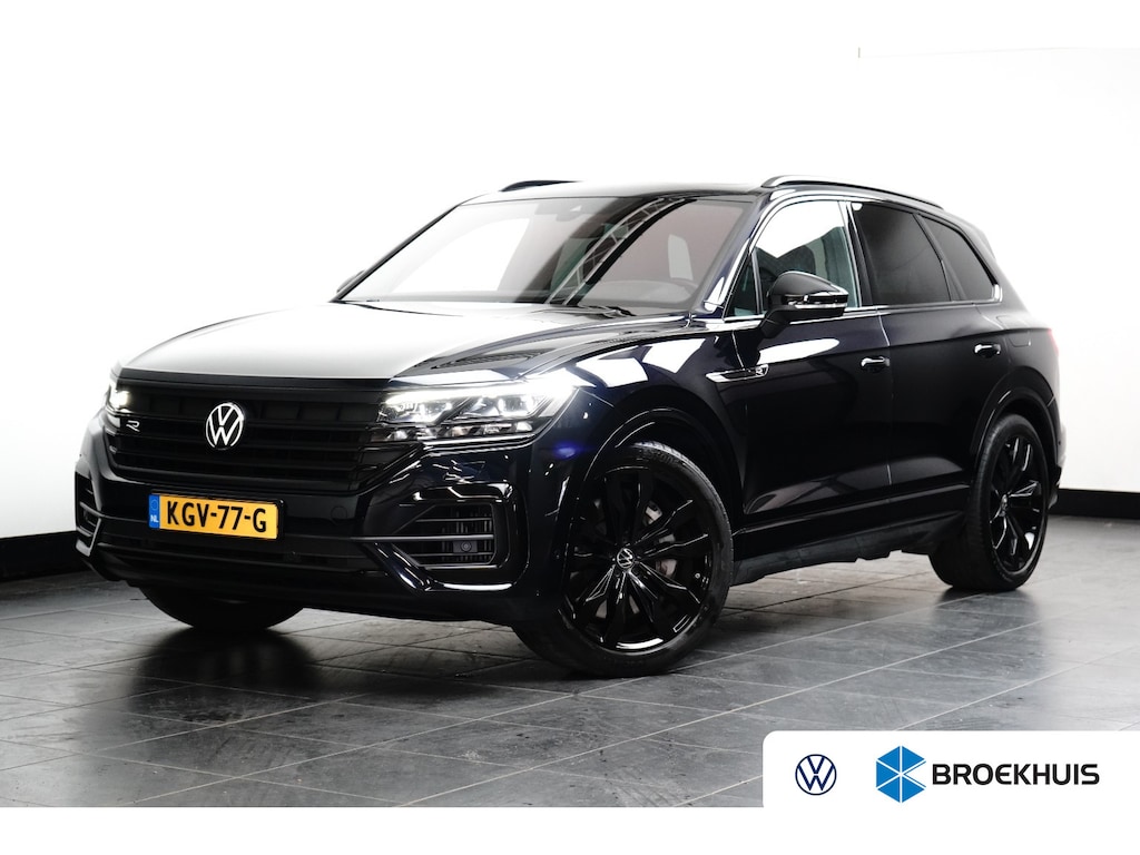 Volkswagen Touareg 3.0 TSi eHybrid 4MOTION R l Dealeronderhouden l Luchtvering l Pano Dak l Matrix LED l Leder Stoel incl Memory l Elektr. Trekhaak l 21" Suzuka Black l