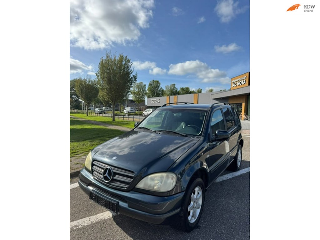 Mercedes-Benz ML-klasse ML 320 (GRIJS KENTEKEN) Airco Electric pakket LMV 17 Cruise Control HANDELSPRIJS!