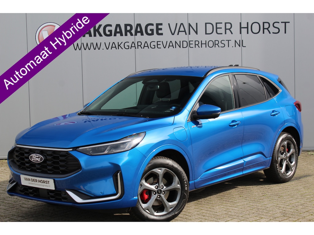 Ford Kuga 2.5 243 pk PHEV ST-Line X januari  2026, slechts 6.500km ! Autm. airco dual, elekt. achterklep, leer/alcantara,  LED verl., navigatie, telefoonvoorb., stoel-, stuur-, voorraam- en achterbankverw., side- en lan