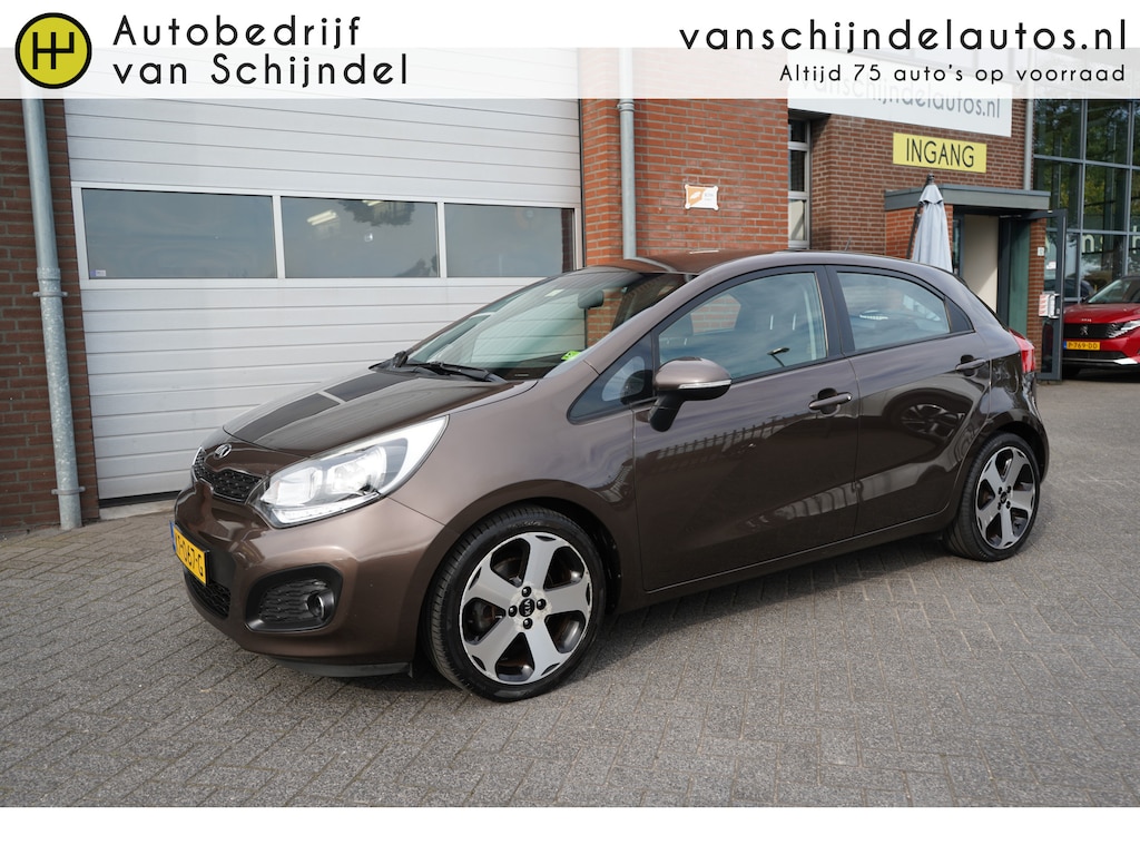 Kia Rio 1.2 CVVT EXECUTIVELINE LUXE 5 DRS MET NIEUWE KOPPELING!! CAMERA AFN.TREKHAAK NAVIGATIE 17INCH STOELVERWARMING ECC AIRCO CRUISECONTROL BLUETOOTH PDC 4X ELECTR.RAMEN-SPIEGELS