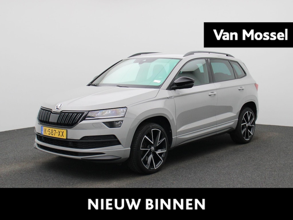 Skoda Karoq 1.5 TSI ACT Sportline Business | STOELVERWARMING | ACHTERUITRIJCAMERA | ADAPTIVE CRUISE CONTROL | CANTON AUDIO | VIRTUAL COCKPIT | ELEKTRISCHE ACHTERKLEP |