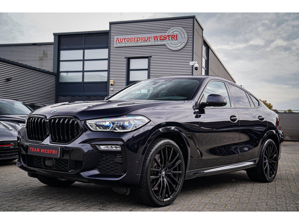 BMW X6 XDrive40i High Executive | Panorama | 360cam | Carbon | Adaptieve cruise control | Kristallen pook | 22 inch | Dealer onder