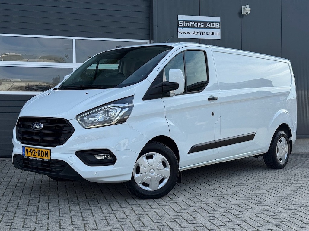 Ford Transit Custom 320 2.0 TDCI 130pk L2H1 Trend | Cruise | Bluetooth | DAB | PDC | Vooruitverw. | Betonplex | EURO6