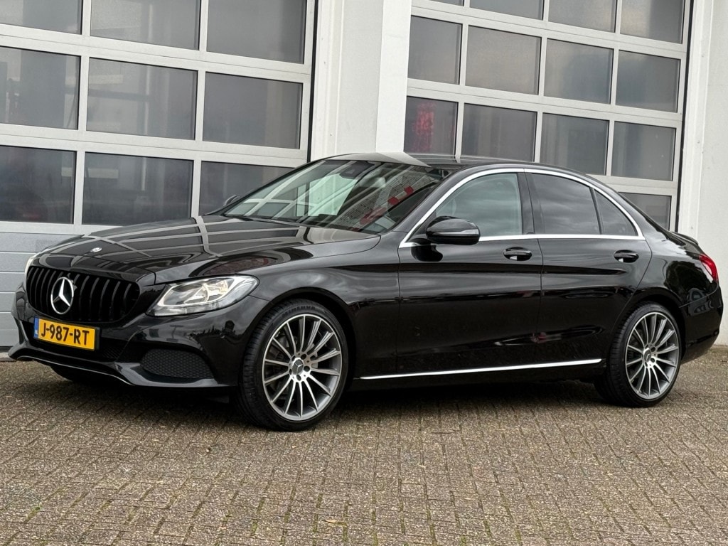 Mercedes-Benz C-klasse C180 Prestige AMG Navi Pdc Leer Stoelver NW APK!