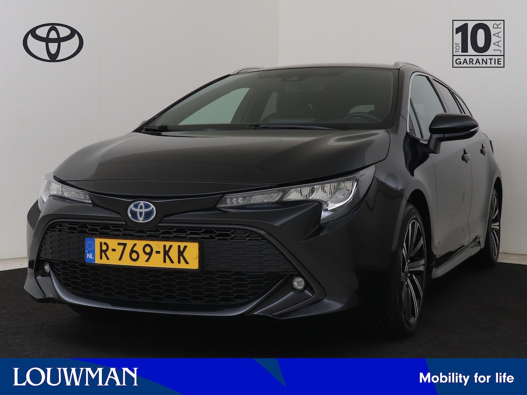 Toyota Corolla Touring Sports 1.8 Hybrid Dynamic | Dealer onderhouden | Trekhaak afneembaar | Stoelverwarming | Draadloze telefoonlader | Navigatie | Apple CarPlay/Android Auto | Cruise Control Adaptive |