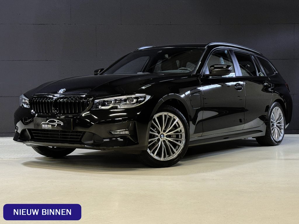 BMW 3-Serie Touring 330e Business Edition Plus | Vol leder | Elektr. trekhaak | Harman/Kardon