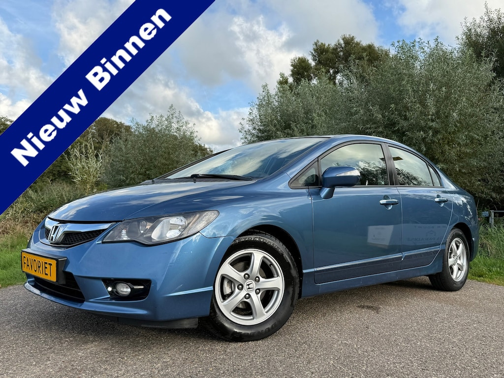 Honda Civic 1.3 Hybrid Automaat | 1e Eigenaar | Clima | Stoelverwarming | Trekhaak | Velours | 15" Velgen | PDC | Cruise | LED |
