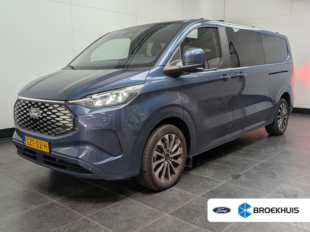 Ford Transit Custom Tourneo 340 L2H1 Titanium X 65 kWh | Elek. Schuifdeuren | Trekhaak | AGR Stoel | Camera | Apple Carplay