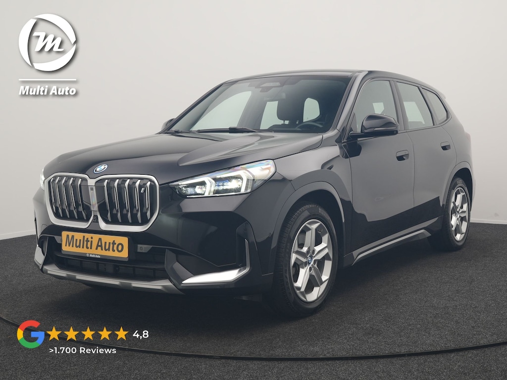 BMW iX1 xDrive30 67 kWh 313pk Dealer O.H. | Adaptive Cruise | Head Up | 360 Camera | Harman / Kardon | Lederen Comfortstoelen Massage & Memory | Keyless | Blis | Sfeerverlichting | Stoelverwarming | Apple Carplay | Navigatie | DAB |