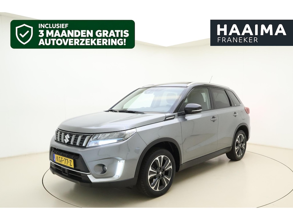 Suzuki Vitara 1.4 Boosterjet Style Smart Hybrid 129pk | Panoramadak | Trekhaak | Climate Control | Cruise Control Adaptief | Camera | Stoelverwarming | Navigatie | Parkeersensoren