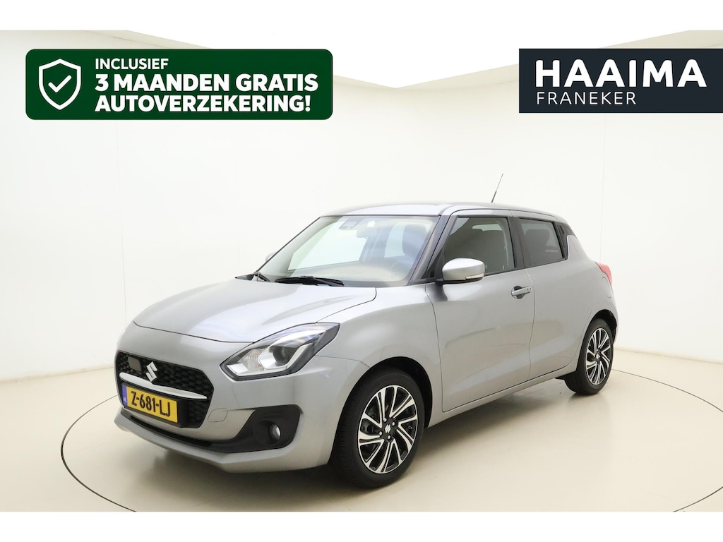 Suzuki Swift 1.2 Style Smart Hybrid 83pk | Navigatie | Climate Control | Cruise Control | Stoelverwarming | Camera | Lichtmetalen Velgen | Apple Carplay - Android Auto