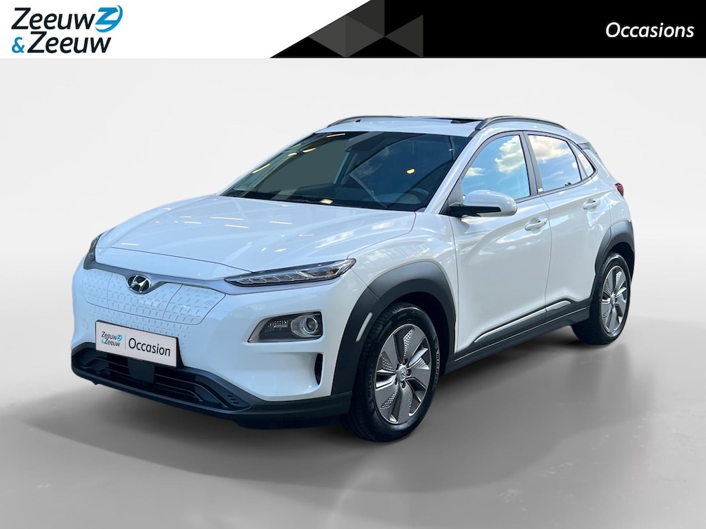 Hyundai Kona Electric EV Fashion 64 kWh 204PK | Warmtepomp | Navigatie | Apple Carplay & Android Auto | Adaptive cruise control | Open dak | Head-up display | Achteruitrijcamera |
