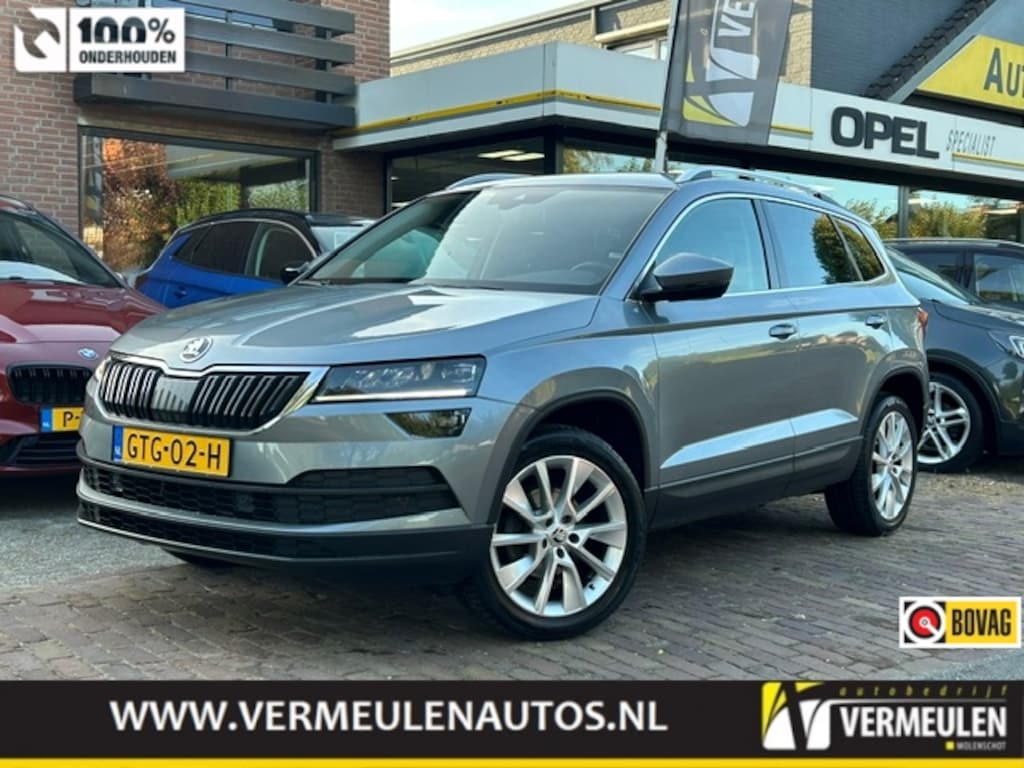Skoda Karoq 1.5 TSI 150PK Business Edition DSG Automaat + 18"/ Navi/ Clima/ Cruise/ CarPlay/ Canton Sound/ Camera/ Stoelverwarming