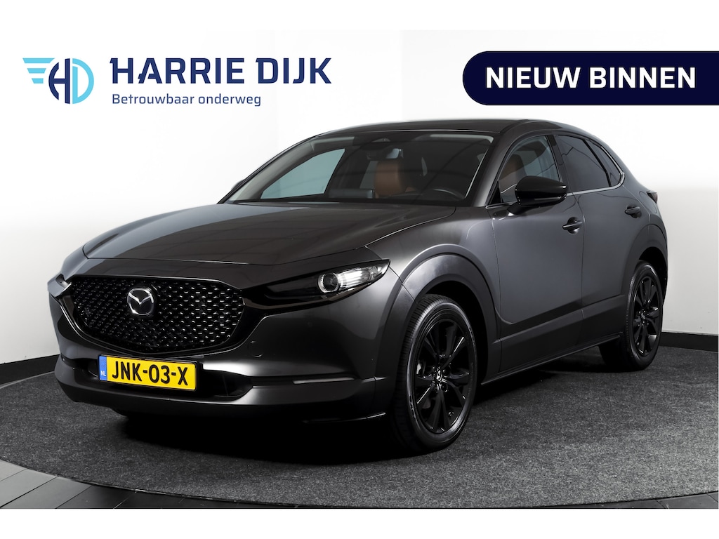 Mazda CX-30 2.0 e-SkyActiv-X 186 PK M Hybrid Nagisa Org. NL. | Adapt. Cruise | Trekhaak | Stoelverw. | PDC | Camera | NAV + App. Connect | ECC | Bose | Elek. Klep | LM 18" |