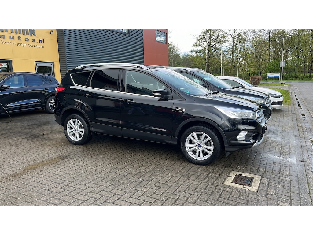 Ford Kuga 1.5 150 pk Titanium trekhaak, apple carplay, autom airco, lederen bekl., camera, winterpack