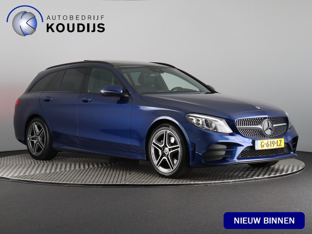 Mercedes-Benz C-klasse Estate 160 Business Solution AMG (NL-Auto / Pano / Afn. trekhaak / Matrix led / Sfeerverlichting)