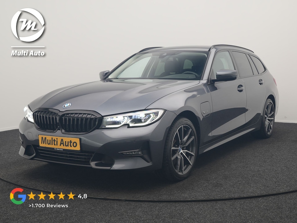BMW 3-Serie Touring 320e xDrive Sportline PHEV 204pk Dealer O.H | Trekhaak Af Fabriek | Camera | Laser LED | Cruise Control | Lederen Sportstoelen Verwarmd | Keyless | Sfeerverlichting | Apple Carplay | BLIS | Virtual | Navigatie | DAB | 18"L.M | Plug In Hybrid |