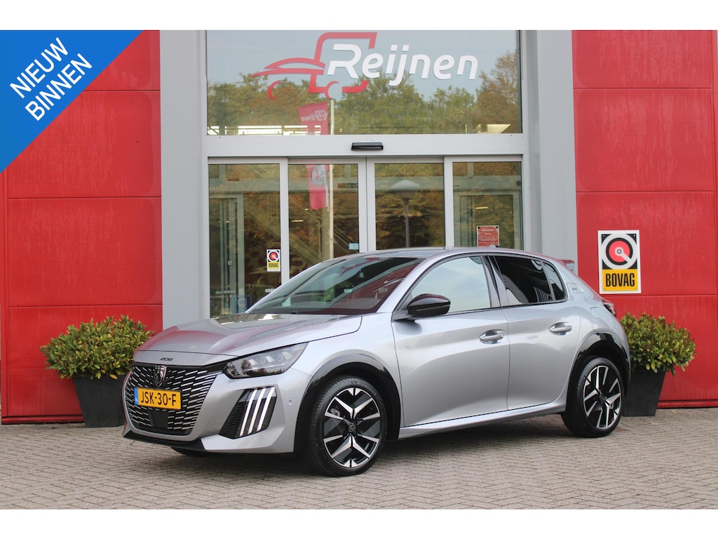 Peugeot 208 1.2 Hybrid 110PK AUTOMAAT GT | CAMERA VOOR + ACHTER | NAVIGATIE | DRAADLOZE APPLE CARPLAY/ANDROID AUTO | FULL LED KOPLAMPEN | LICHTMETALEN VELGEN 17" | DODEHOEK DETECTIE | DRAADLOZE TELEFOONLADER | KEYLESS ENTRY/START | DAB+ RADIO | ADAPTIVE CRUISE CONTROL | CLIMATE CONTROL | SFEERVERLICHTING |