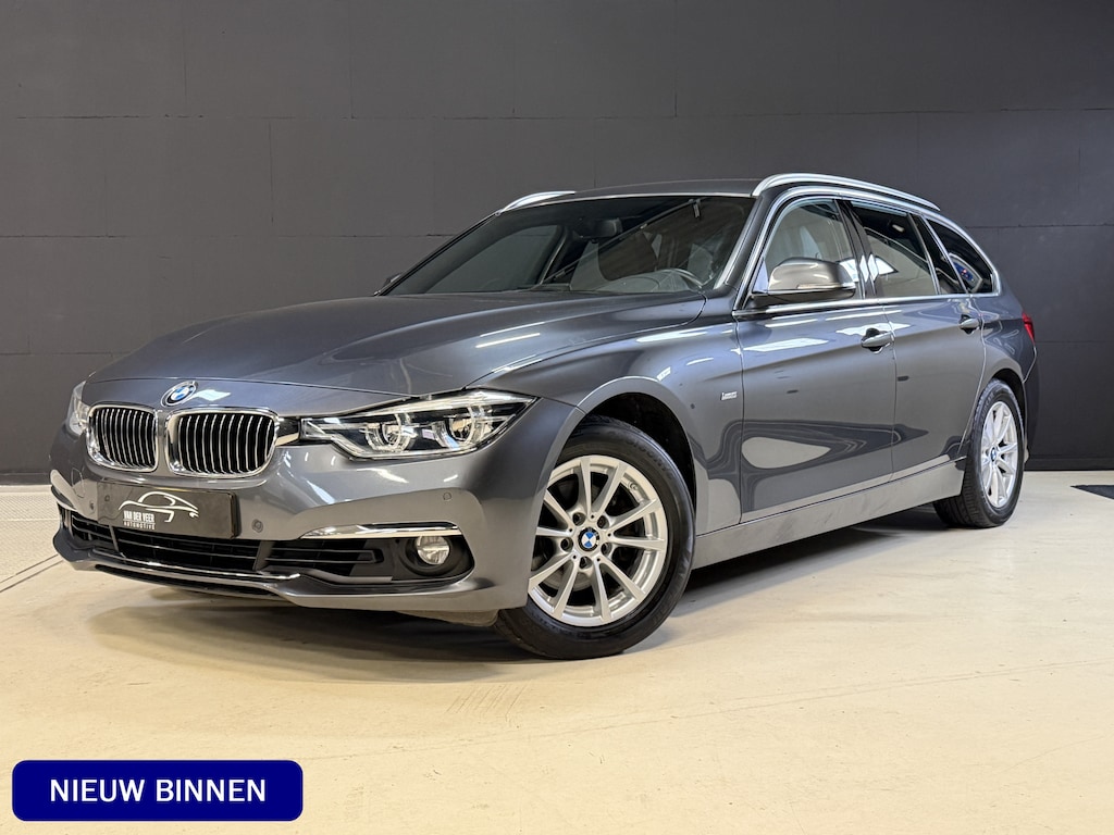 BMW 3-Serie Touring 318i High Executive Automaat | Leder | Stoelverwarming | Full LED | Navi | PDC V+A
