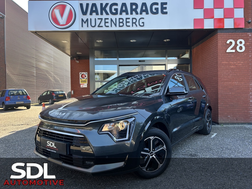 Kia Niro Hybrid 1.6 GDi DynamicLine // DEALER ONDERHOUDEN // ELEK. STOEL // KEYLESS // NAVI + CARPLAY // STOEL + STUURWIELVERWARMING // PDC // CAMERA // HALF-LEDER