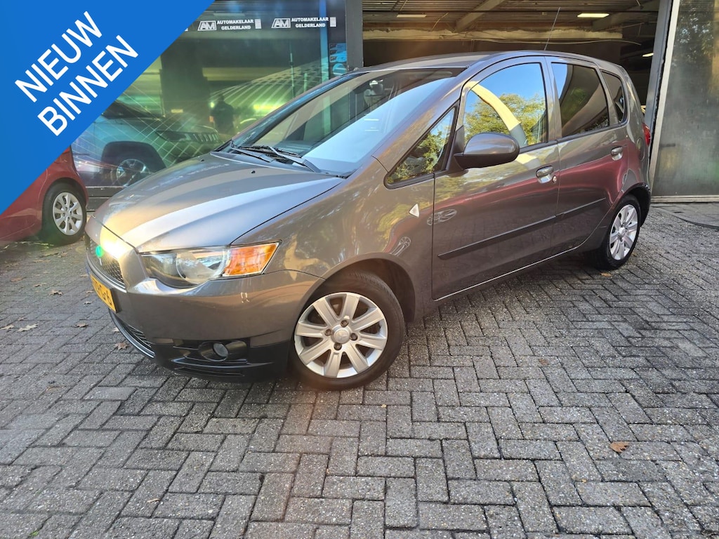 Mitsubishi Colt 1.3 Edition Two | 2E EIGENAAR | 3/6 OF 12MND GARANTIE | 64.464 KM | AIRCO | LMV | CRUISE |