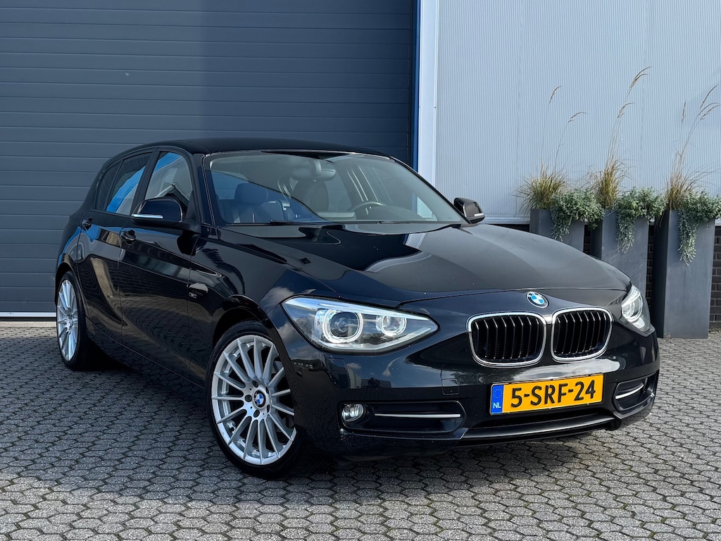 BMW 1-Serie 116i EDE Business Sport | Cruise | Navi | Trekhaak | 18" | Xenon