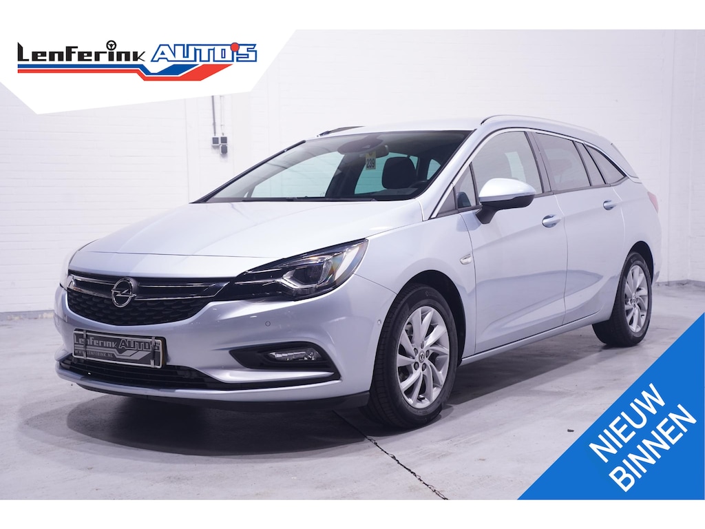 Opel Astra Sports Tourer 1.4 Innovation NAP 2e-eigen. PDC v+a privateglas afneembare-trekhaak lendesteun 16"-lmv electr-achterklep cruise-controle stuurbediening Navigatie bleutooth Camera stoelventilatie/verwarming lederen-sportstoelen links met memo massage