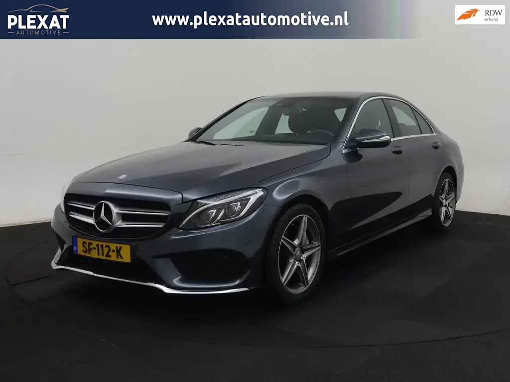Mercedes-Benz C-klasse 180 Prestige Aut. | AMG-Pakket | Stoelverwarming | Lederen Bekleding | Full Led | Climate | 18 Inch | NAP |