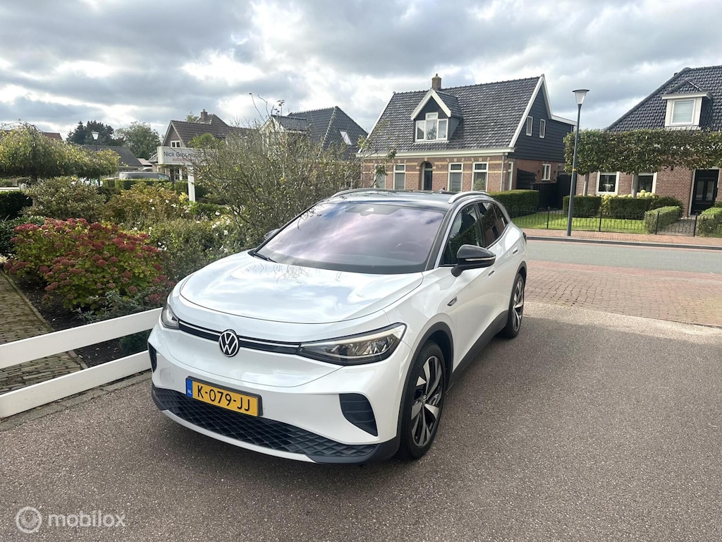 Volkswagen ID.4 First 77 kWh STUUR/STOELVERWARMING WEGDRAAIBARE TREKHAAK CARPLAY SFEERVERLICHTING CAMERA ACCU GARANTIE!!