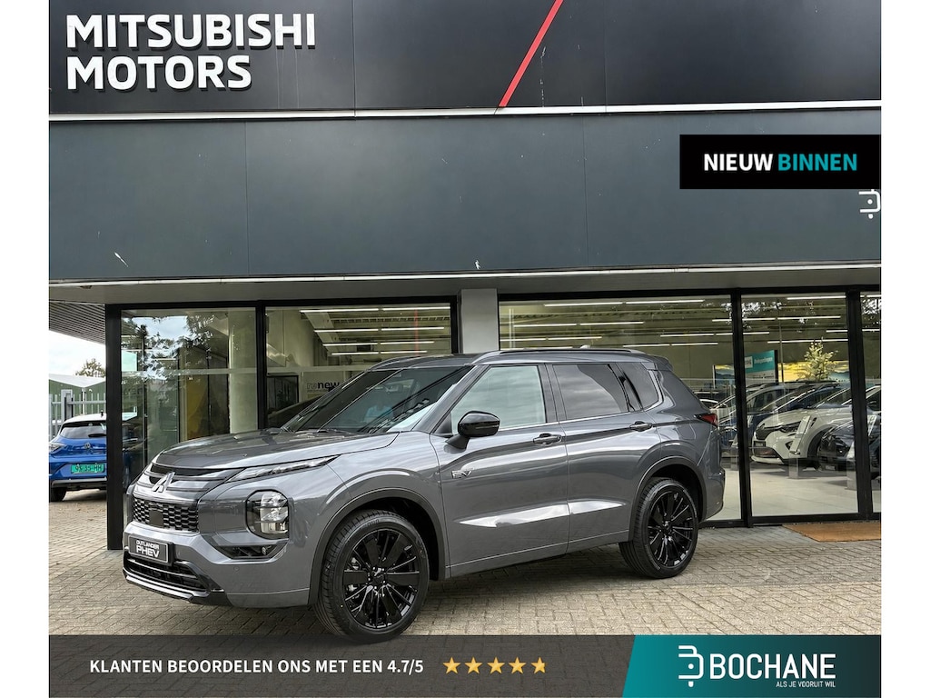 Mitsubishi Outlander 2.4 PHEV Black Edition NIEUW UIT VOORRAAD LEVERBAAR | Lederen bekleding | Stoelmassage | Climate Control voor- en achter | Stoelverwarming voor- en achter | Parkeersensoren voor- en achter | Adaptieve Cruise Control | Navigatiesysteem | 8 jaar fabrieksgarantie