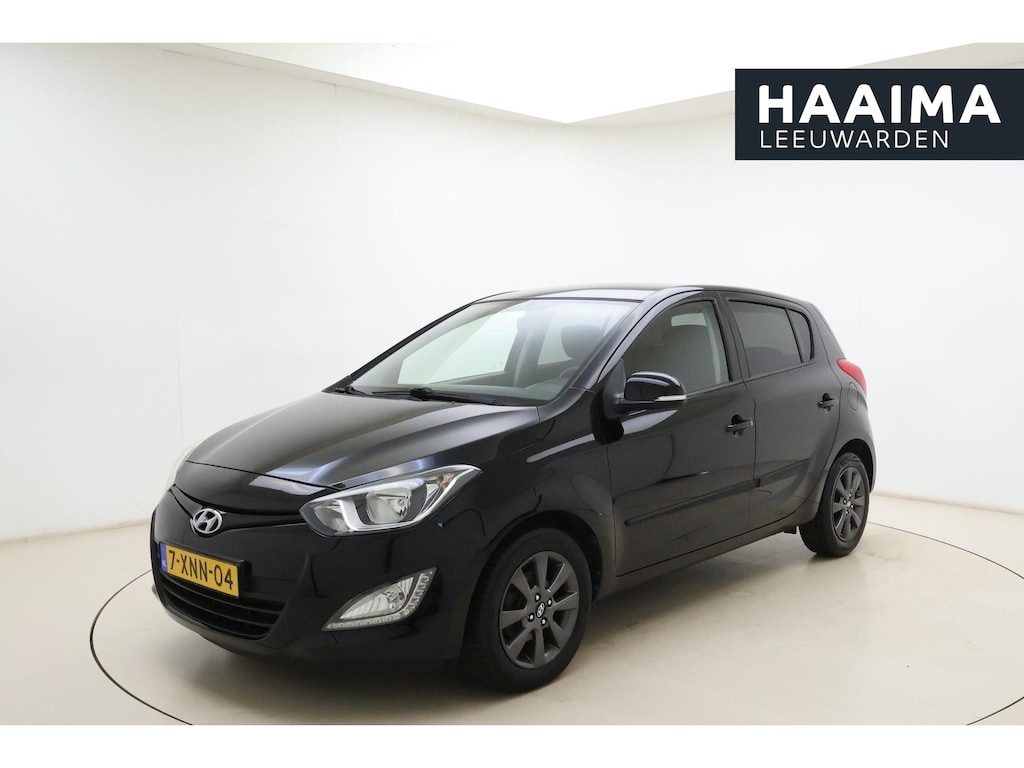 Hyundai i20 1.2i i-Vision | Parkeersensoren | Cruise control | Stuurbediening | Airco | CD/USB Plug-in | Climate control | Achteruitcamera |