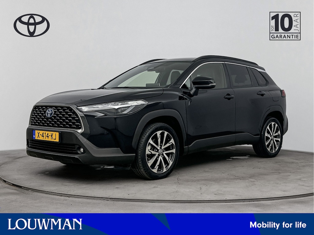 Toyota Corolla Cross Hybrid 140 Style | Half Lederen bekleding | Dealeronderhouden | NL auto | Stoelverwarming | Dodehoek detectie | Parkeersensoren voor+achter | elektrische Achterklep |