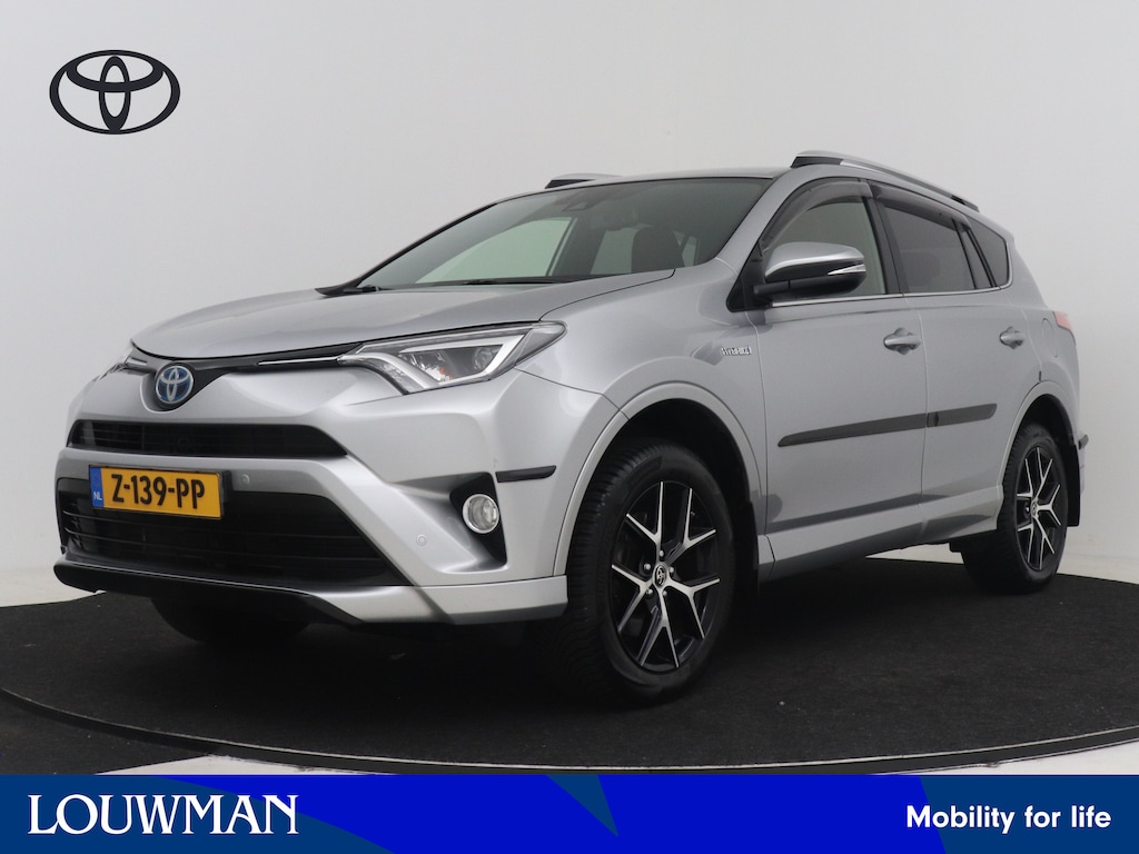 Toyota RAV4 2.5 Hybrid AWD Style | Dealer onderhouden | Rood Leder | Stoelverwarming | Navigatie | Climate Control | Cruise Control Adaptive | Parkeersensoren voor+achter | Elektrische achterklep |