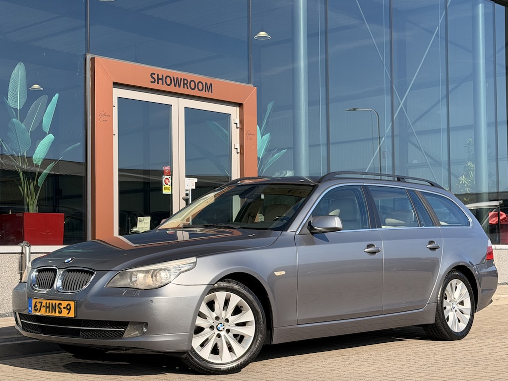 BMW 5-Serie Touring 520i Business Line | Cruise | Navi | Leder | Stoelverwarming + Half elek. | Trekhaak | Bluetooth |