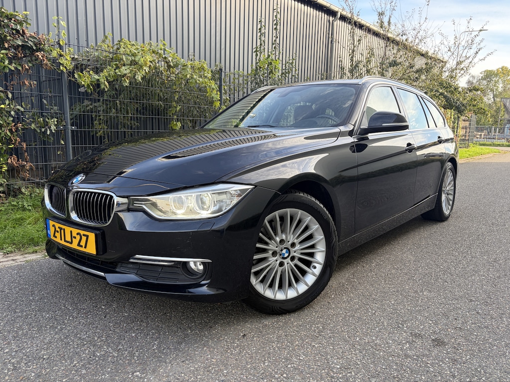 BMW 3-Serie Touring 316i High Executive / AUTOMAAT / NAVI / LEER / CRUISE / TREKHAAK