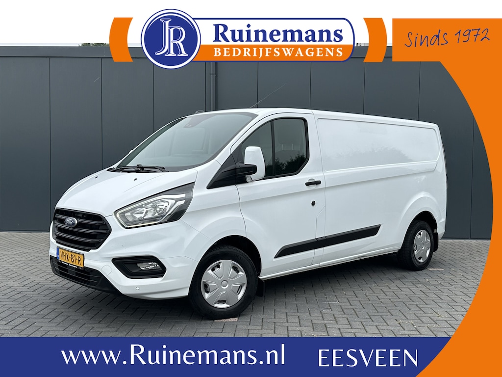 Ford Transit Custom 2.0 TDCI / L2H1 / 1e EIG. / CAMERA / CARPLAY / AIRCO / CRUISE / VOORRUITVERW / 3 ZITS / PDC / 2.800 KG AHG