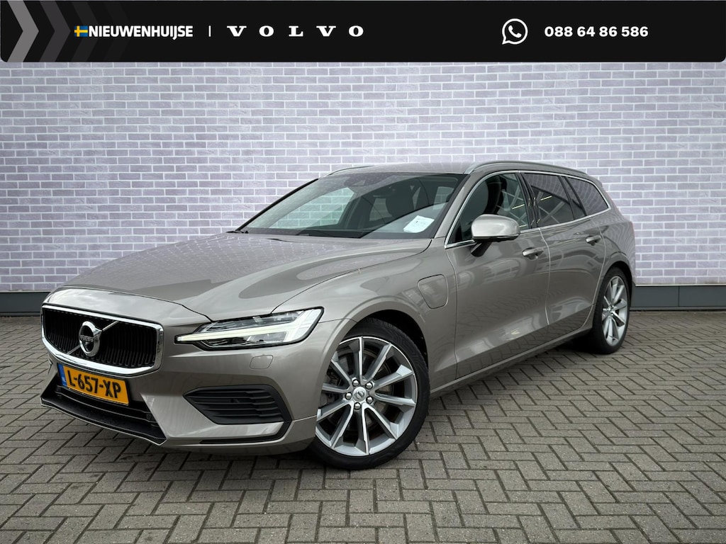 Volvo V60 2.0 T6 Twin Engine AWD Momentum Pro | Stoel/stuurverwarming | Trekhaak | Adapt. Cruise Control | 360 camera | Head-up display | Elektr. bestuurdersstoel + geheugen | Getint glas |