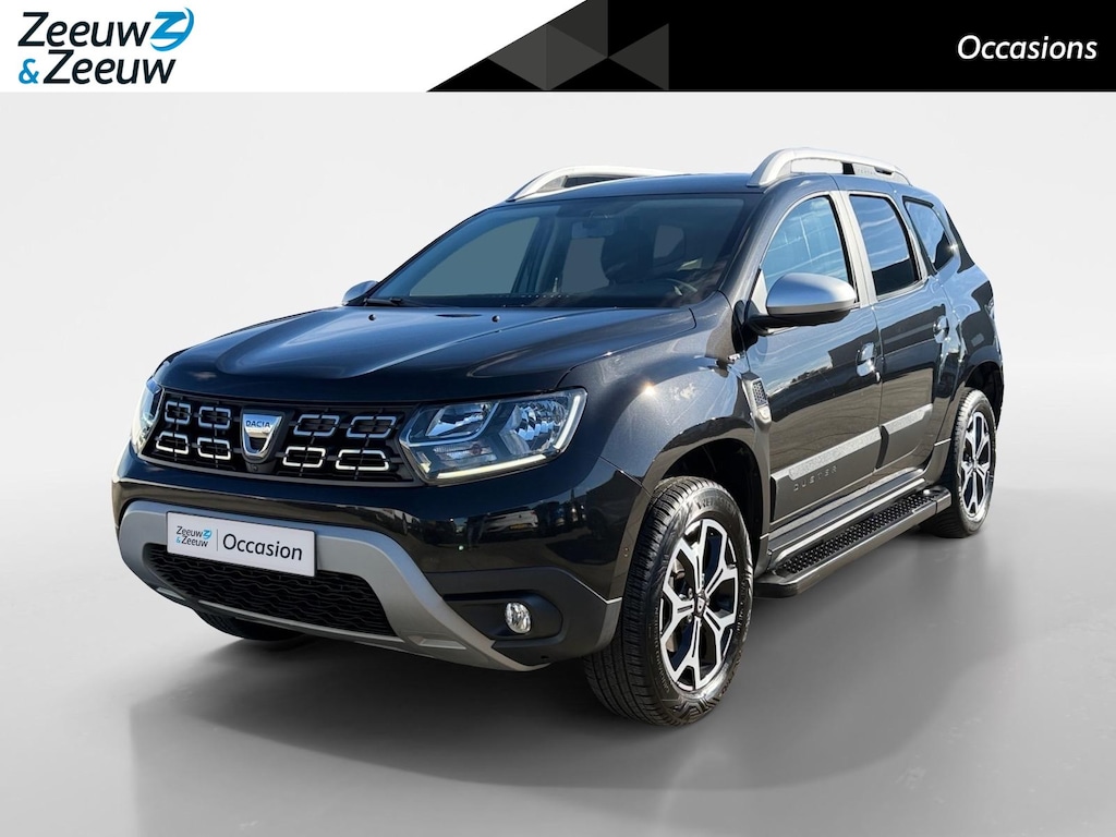 Dacia Duster 1.3 - 150PK TCe Tech Road | Trekhaak | 360 Camera | Stoelverwarming | Climate Control | Lichtmetalen Velgen | Sidebars | Elektrische Ramen & Spiegels | Licht & Regen Sensor |