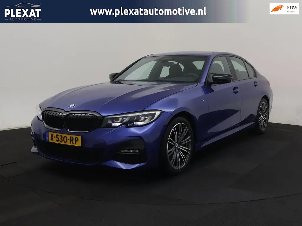 BMW 3-Serie 330i High Executive Aut. | M-Pakket | Full Led | Portimao Blau | Stoelverwarming | Historie | Sportstoelen | Alcantara