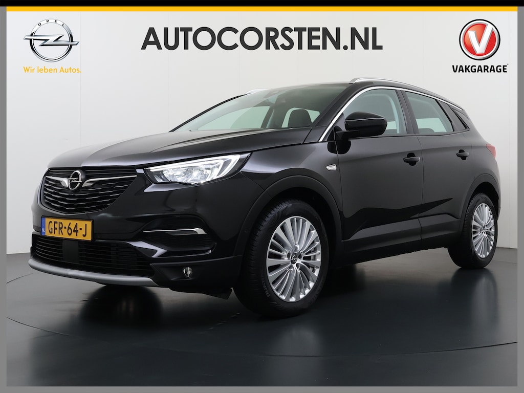 Opel Grandland X 1.2T 131pk Camera Apple/Android Elek.klep Bordherk. Blindspot 1/2Leer Navi Lane-dep. Keyless Aut.Verlichting Led Usb Tel. Ecc CruiseControl Innovation Regensensor Pdc Mistlampen Elek.Inkl.Spiegels 18''LM 1.2Turbo