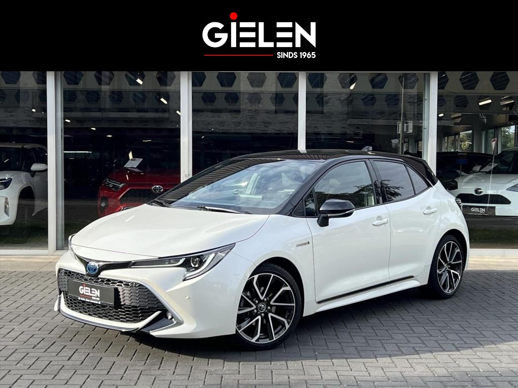 Toyota Corolla 1.8 Hybrid Executive | Parelmoer wit, 18 inch, Leer/Alcantara, Stoelverwarming, Parkeersensoren, Keyless, Apple CarPlay/Android auto