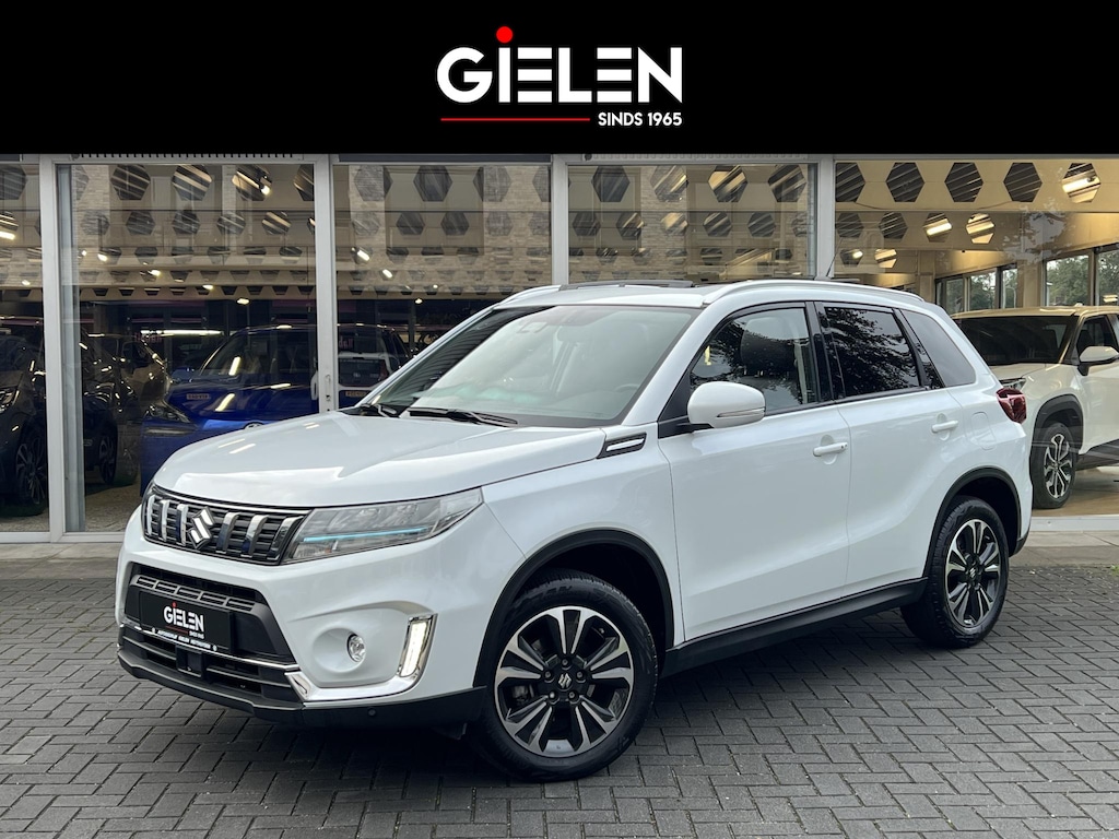 Suzuki Vitara 1.5 Hybrid Style | Trekhaak, Panoramadak, Dodehoekherkenning, Parkeersensoren, Half leer, Stoelverwarming, Keyless
