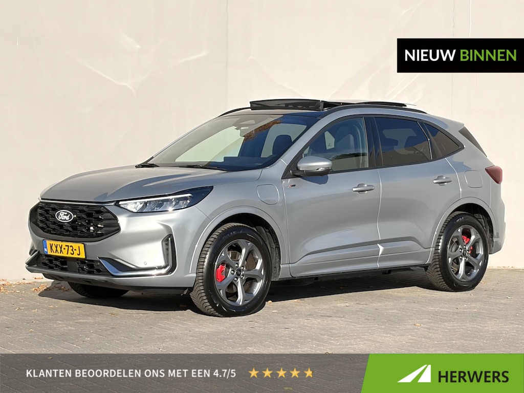 Ford Kuga 2.5 PHEV ST-Line X / 2.100 kg Elektrische trekhaak / Fabrieksgarantie tot 03-2028 / Elektrisch glazen panorama-dak / Stuur-, stoel- & achterbankverwarming / B&O audio / Apple Carplay Android / 18"LM wielen & All Season banden /