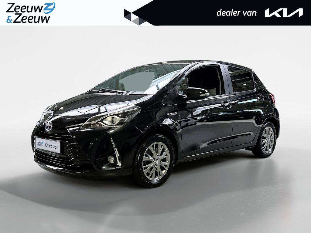Toyota Yaris 1.5 Hybrid Dynamic | Apple Carplay / Android Auto | Parkeersensoren Voor | Parkeercamera Achter | Lichtsensor + Regensensor | Cruise Control | Rijstrooksensor | 15"Lichtmetalen Velgen