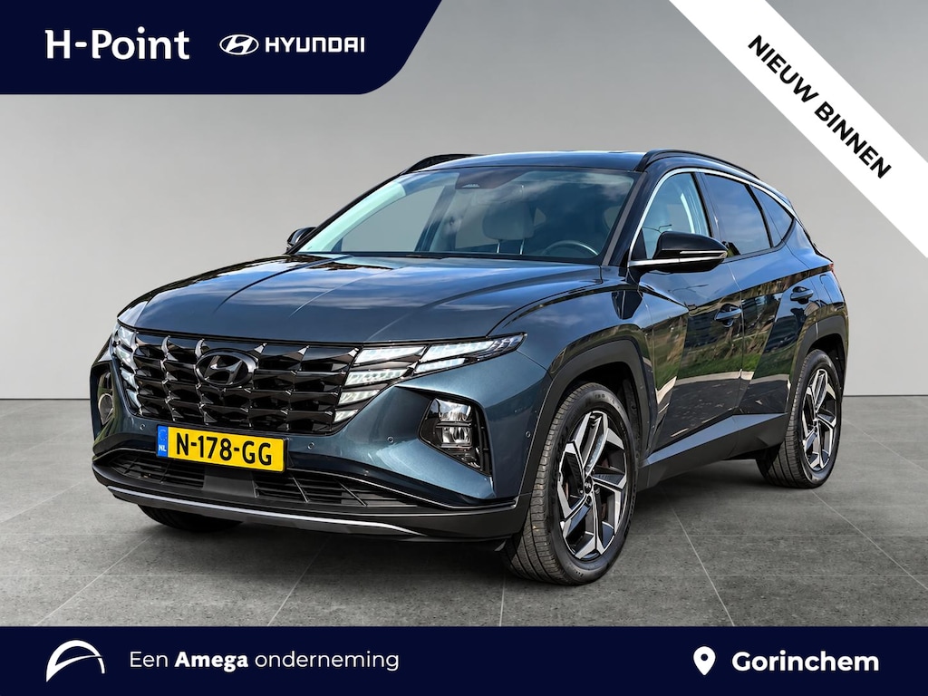 Hyundai Tucson Premium 1.6 T-GDI HEV 230pk | 360° CAMERA | STOELVERW. V + A | STOELVERKOELING | ADAPTIVE CRUISE | HUD | APPLE CARPLAY / ANDROID AUTO | LEDER | ELEKTRISCHE STOELVERSTELLING | MEMORY FUNCTIE |
